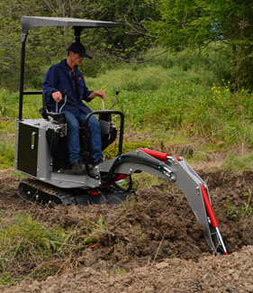 RETROESCAVADORA DE ESTEIRA COM BALDE DE 8' TS8100